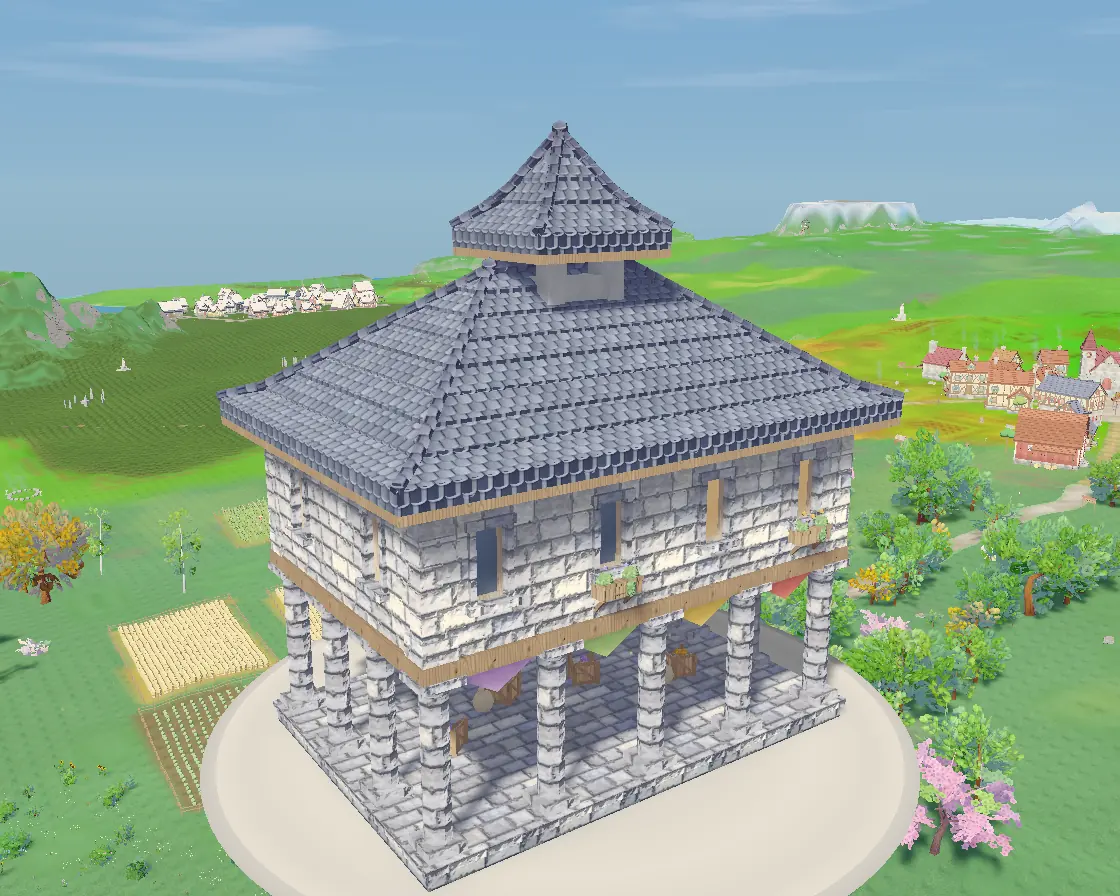 A mountain market hall of grey stone with a blue slate roof and balconies.