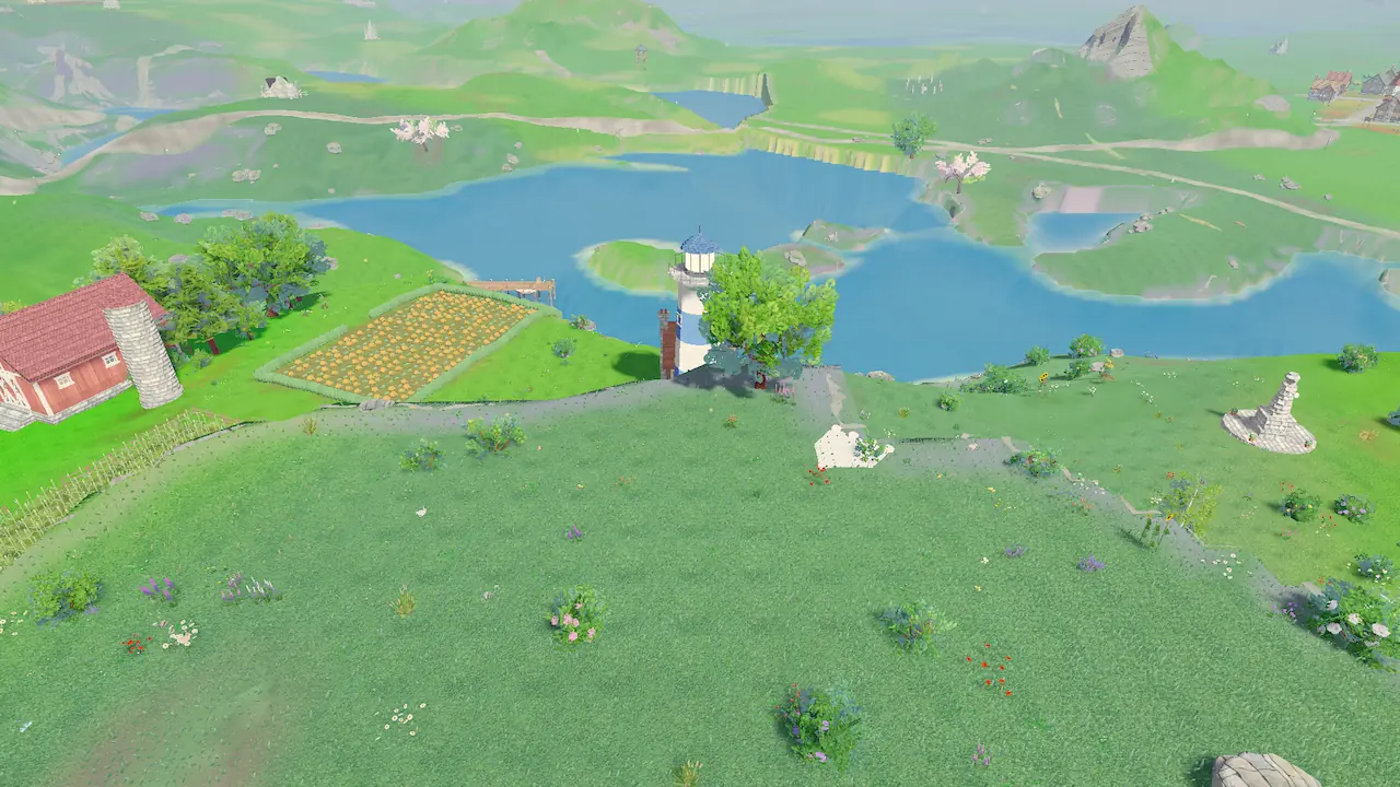 A white lighthouse on a green point above a wide blue lake, with a red barn and fields on the shore.